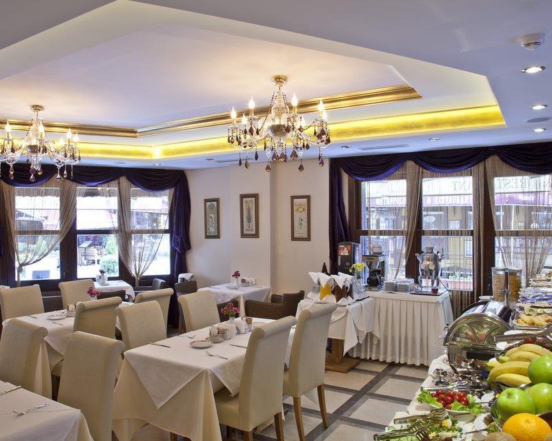 فندق اسطنبولفي  جي إل كيه بريميير أكروبول سويتس آند سبا المطعم الصورة